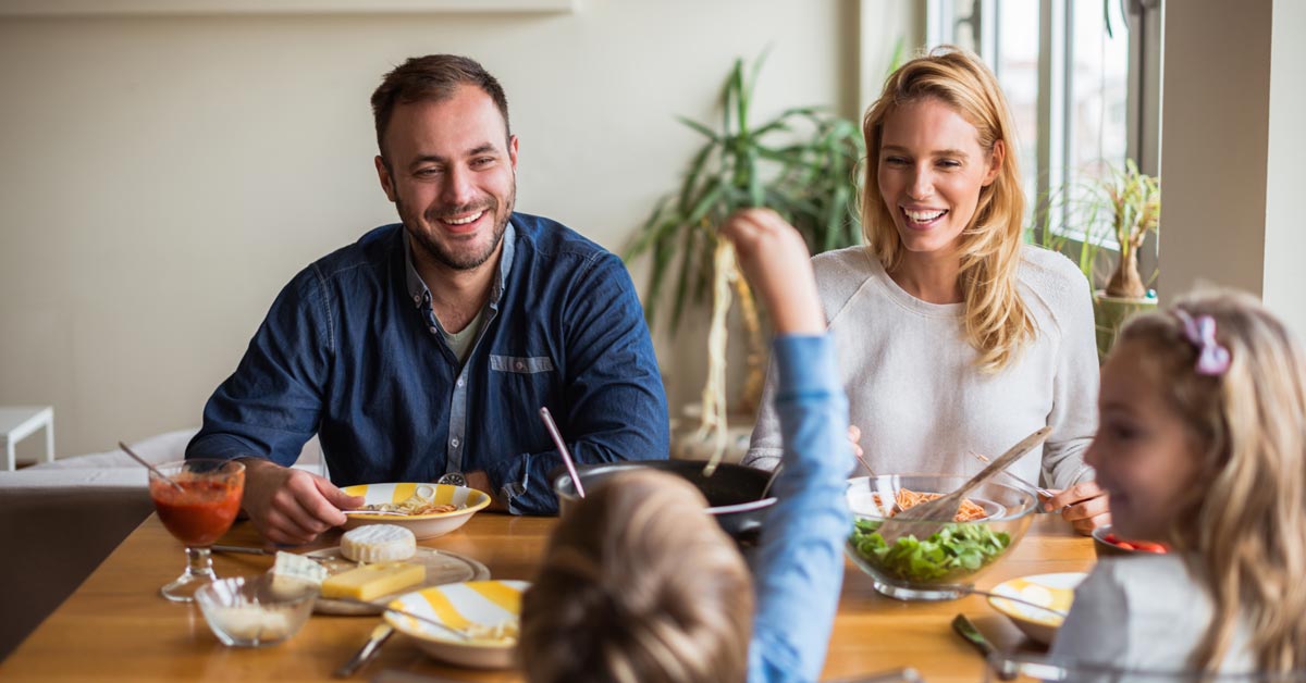 Happy Family Eating Dinner Happy Family Eating Dinner