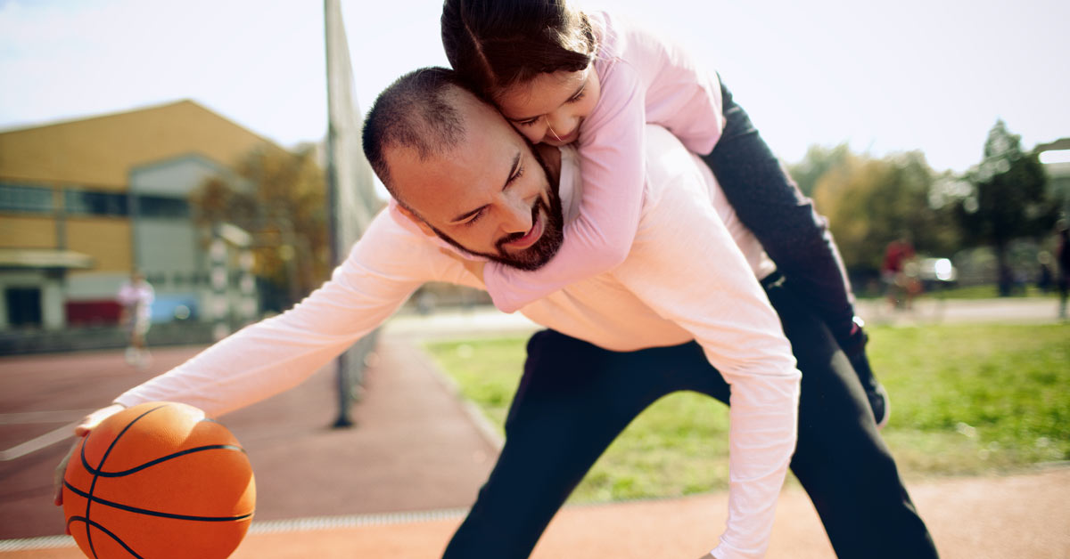 Happy Dad Playing Basketball with Daughter Happy Dad Playing Basketball with Daughter